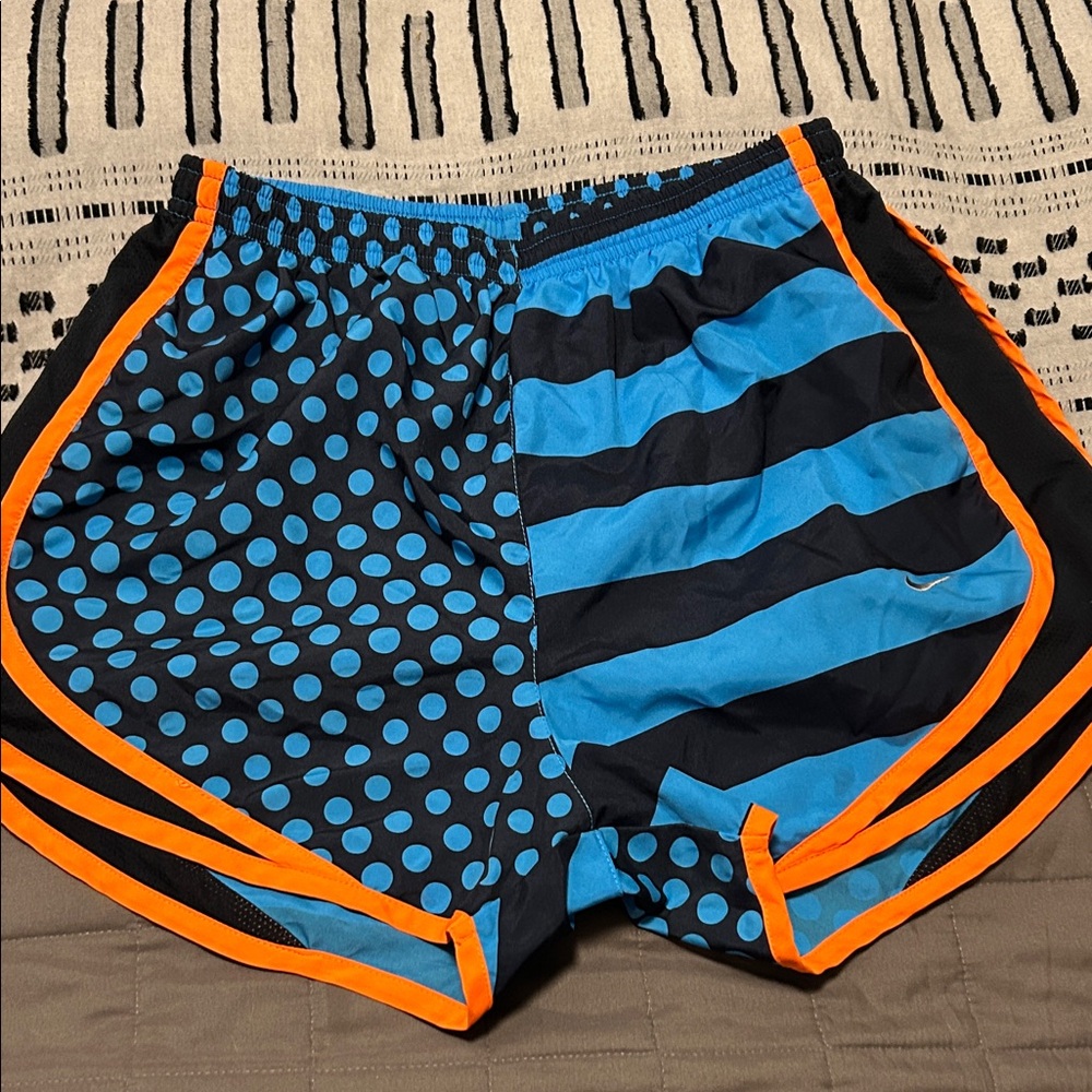 Nike Blue and Black Athletic Shorts with Orange Accents